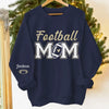 Custom Football Mom Unisex Sweatshirt, Hoodie With Design On Sleeve Personalized Birthday Football Gifts For Mom, Football Lovers, NFL Fans, Sport Lovers - Proud Football Mama with Kids Name